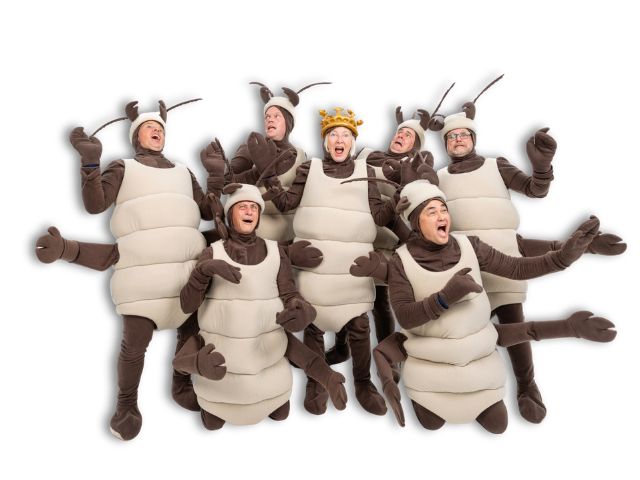 Photo of Conquer Termites in termite costumes looking scared