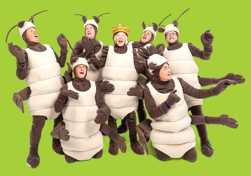 A photo of Conquer team members in termite costumes